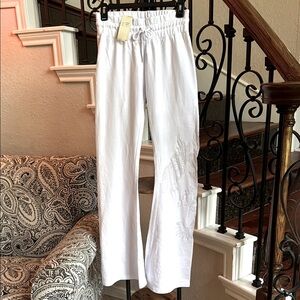 VERTIGO Low-rise Flare White Jersey Pants, Medium